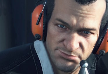 A close-up of Frank West's face in Dead Rising Deluxe Remaster