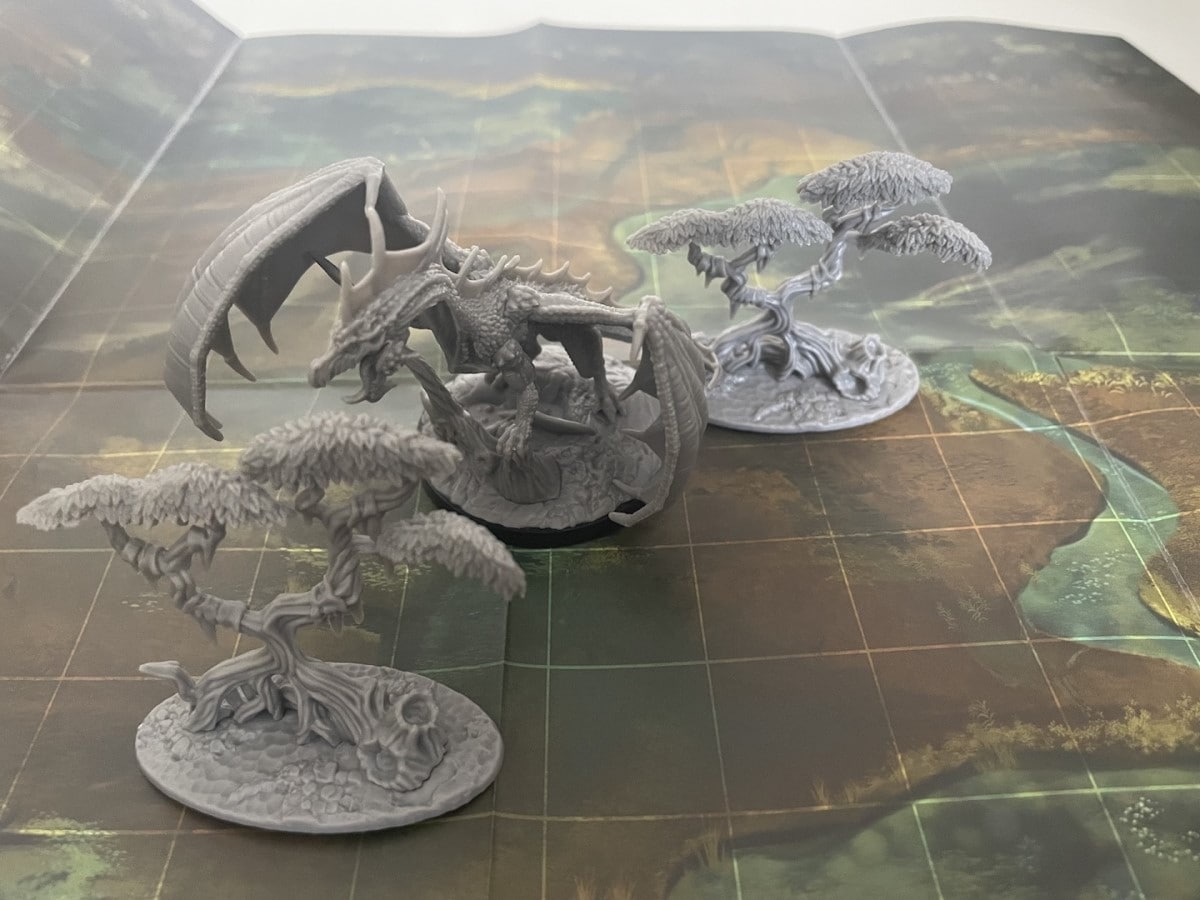 A screenshot of miniatures and maps from the Epic Encounters: Local Legends Green Dragon encounter