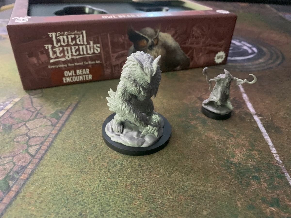 A screenshot from the Epic Encounters: Local Legends Owlbear encounter, showing miniatures on a gaming mat.