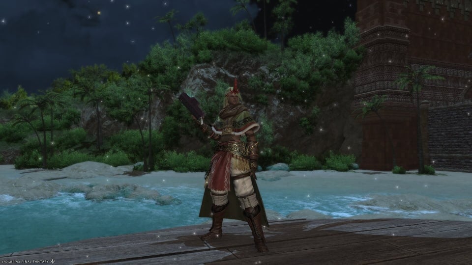 Character wearing level 100 Summoner gear, with a beach backdrop.