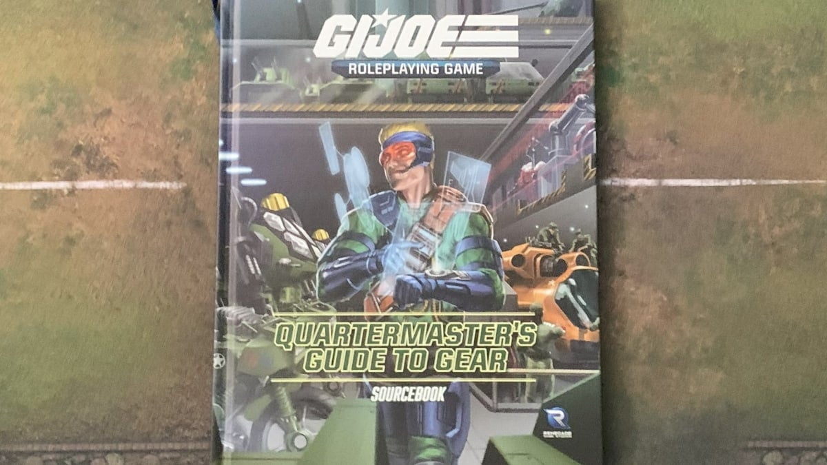 A copy of GI Joe Quartermaster's Guide to Gar on a gaming mat