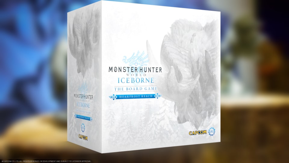 Photograph showing the cover of Monster Hunter World Iceborne: The Board Game with a blurred photo in the background. 