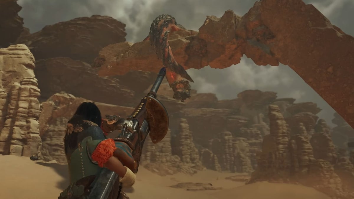 The player aims the heavy bowgun at a monster in Monster Hunter Wilds