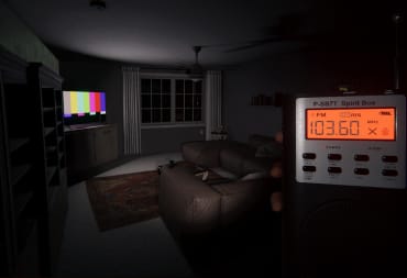 The player holding a Spirit Box tool in a dark room with a switched-on TV in Phasmophobia