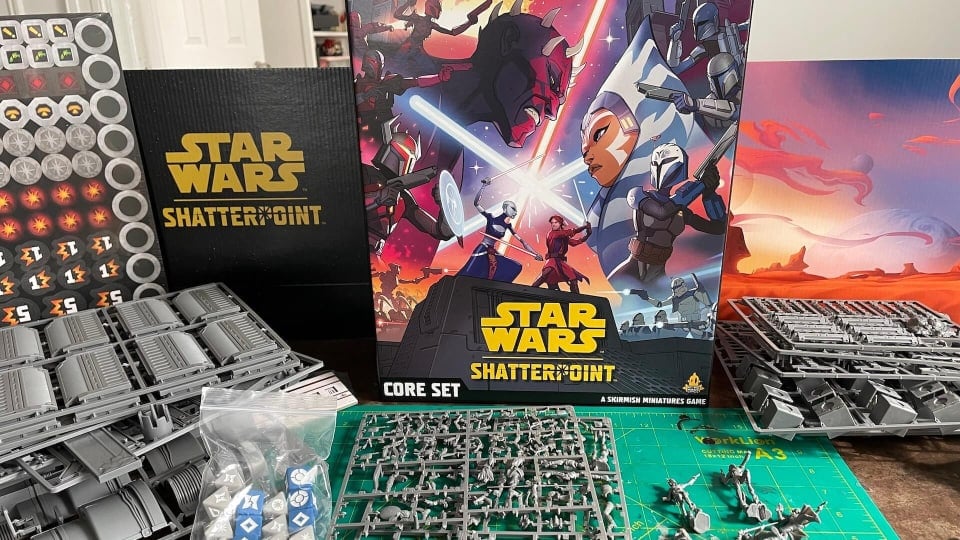 An image of the box and contents of Star Wars Shatterpoint, a new skirmish board game featuring lots of gray plastic sprues.