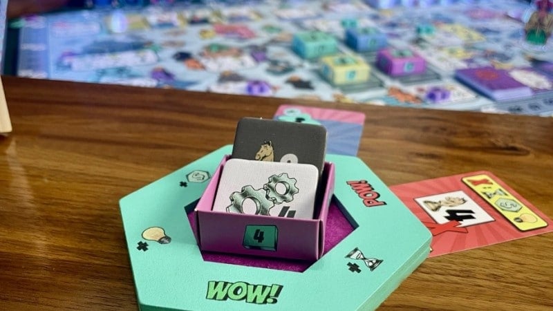 A screenshot of the board game Tabletop Inc, showing a game board and game pieces