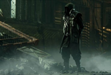 A mysterious hooded figure standing amidst smoky ruins in the Warhammer 40k: Darktide Secrets of the Machine God update