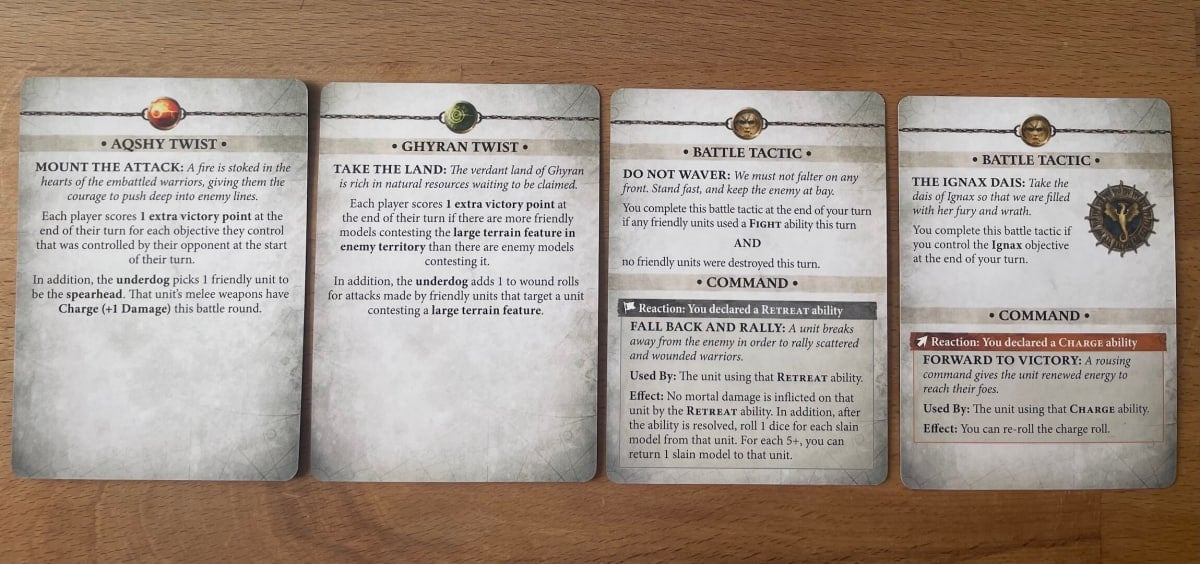 An image from our Warhammer Age of Sigmar Skaventide review depicting the different cards used in Spearhead