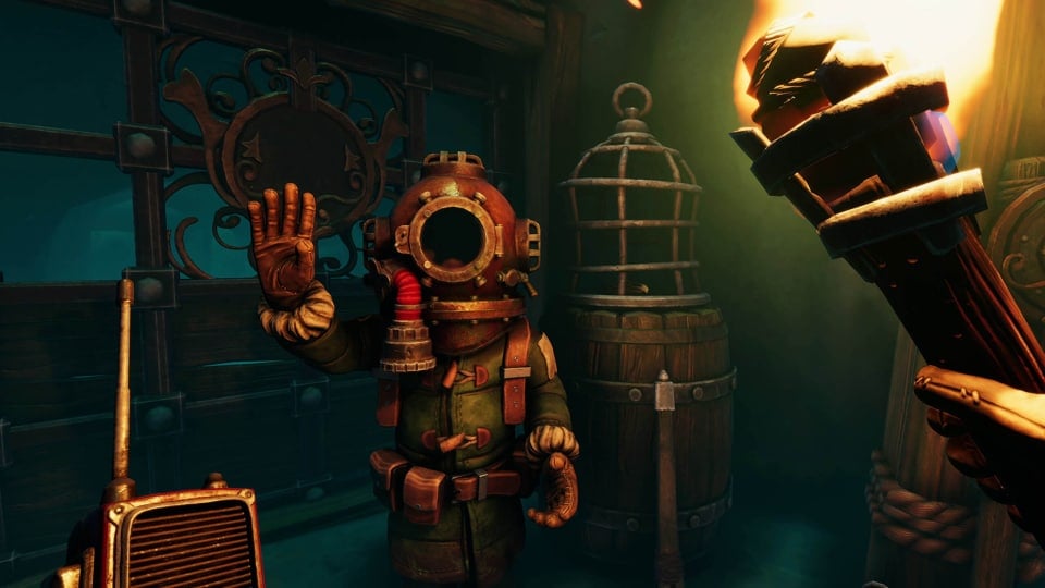 A figure in a diving suit raising a hand in greeting in We Were Here Forever