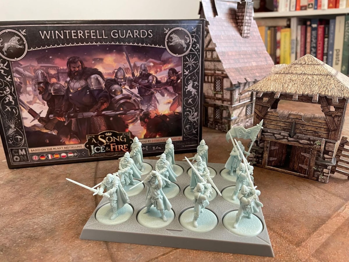 This image of Winterfell Guard from our A Song of Ice and Fire TMG Review depicts armored men protecting Winterfell just like in Game of Thrones